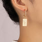 Rectangle drop earrings with etched heart